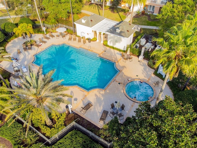 view of pool featuring a patio area and a hot tub