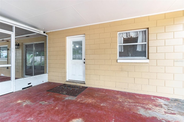 doorway to property featuring a patio area