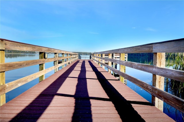 view of dock with a water view