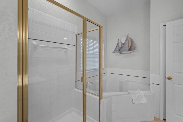 bathroom with independent shower and bath