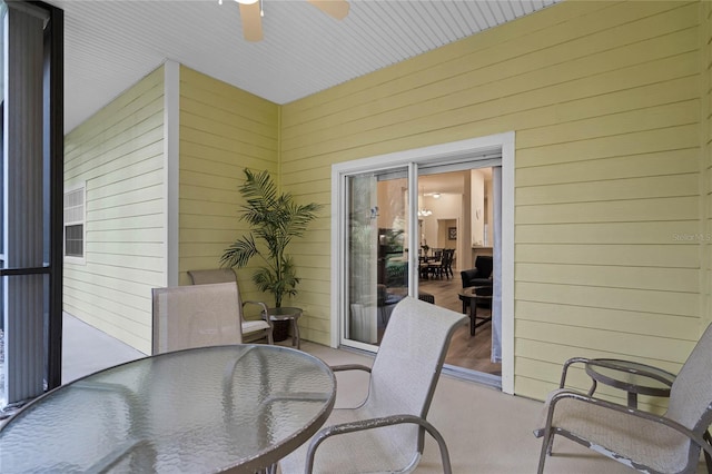 306 Lucaya Loop Unit B5/U306, Davenport, FL 33897 - exterior space with outdoor dining space and ceiling fan
