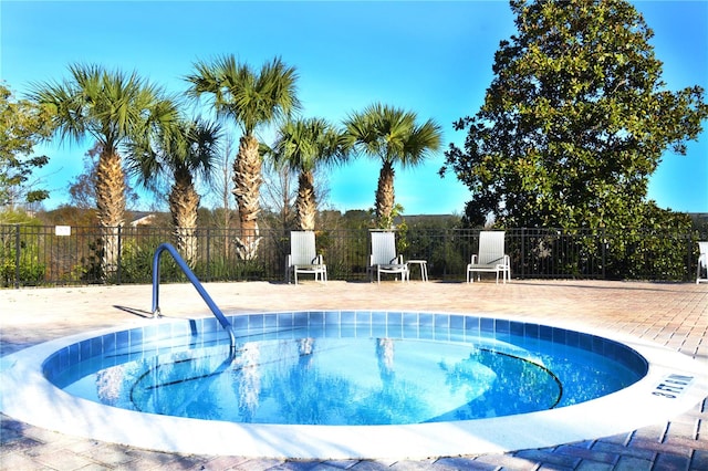 view of swimming pool with a patio area