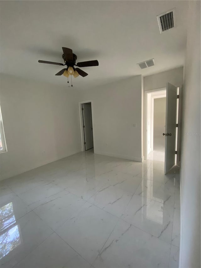 empty room with ceiling fan