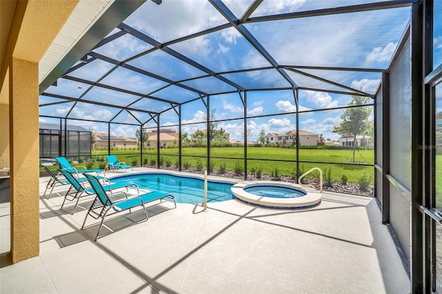 view of swimming pool with glass enclosure, a yard, an in ground hot tub, and a patio area