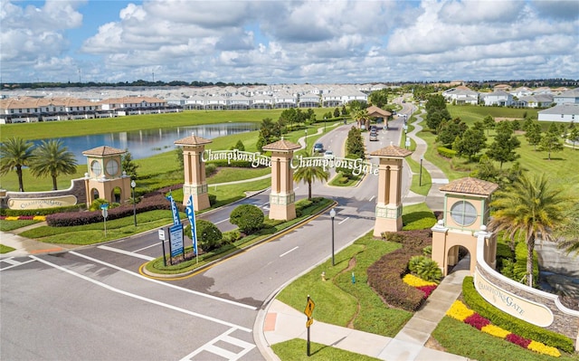 birds eye view of property featuring a residential view and a water view