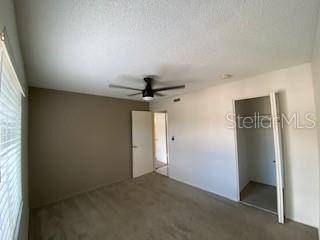 empty room with ceiling fan