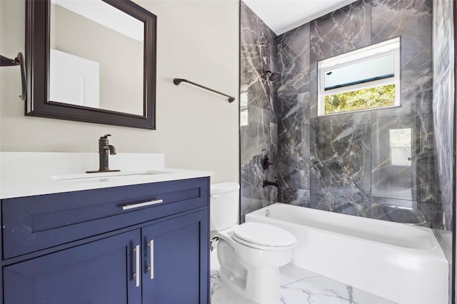 full bathroom with tiled shower / bath, vanity, and toilet