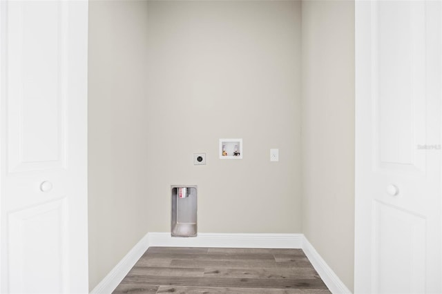 washroom featuring washer hookup, electric dryer hookup, and hardwood / wood-style flooring