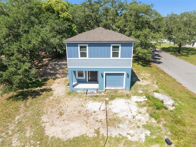 view of front of property featuring a garage