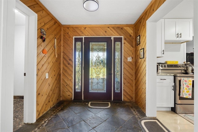 entrance foyer with wood walls