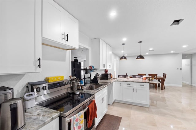 kitchen featuring white cabinets, hanging light fixtures, stainless steel electric range oven, and kitchen peninsula