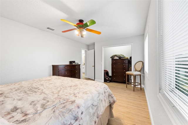 bedroom featuring ceiling fan and light hardwood / wood-style flooring