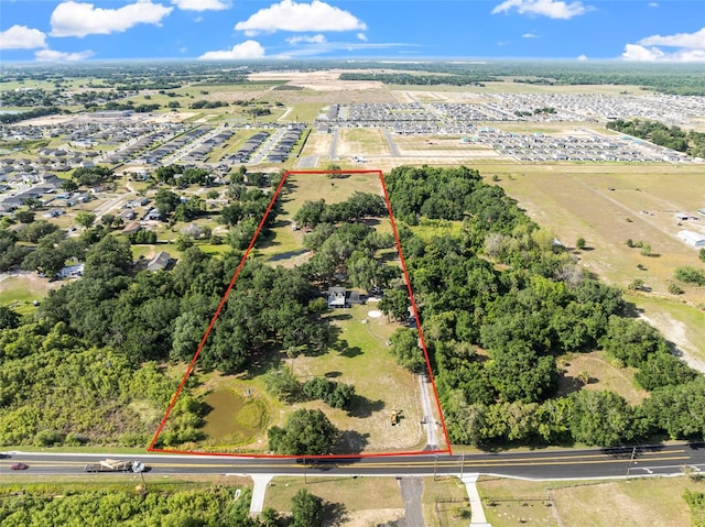 4350 E Hinson Ave, Haines City, FL 33844 - aerial view of property's location with property boundaries highlighted