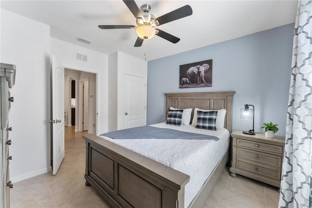 tiled bedroom featuring ceiling fan