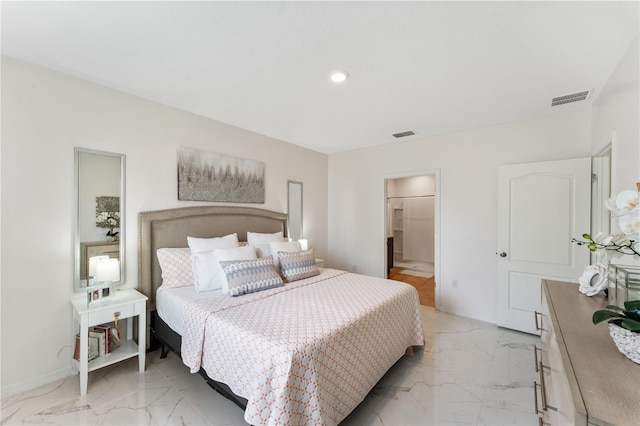 bedroom featuring ensuite bath