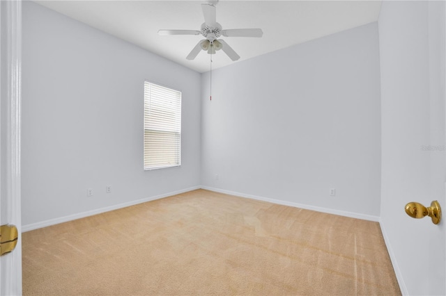 unfurnished room with light carpet and ceiling fan