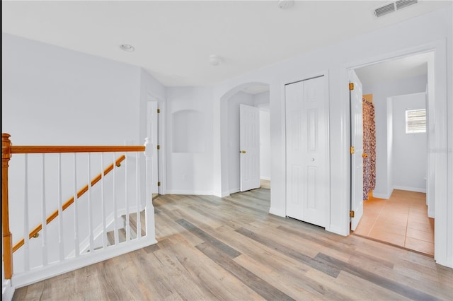 hallway featuring light hardwood / wood-style floors