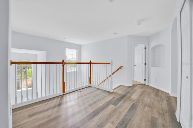 unfurnished room with light hardwood / wood-style flooring