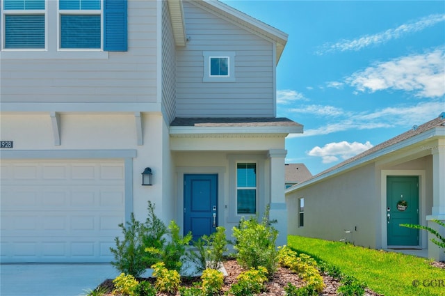 view of front of property featuring a garage