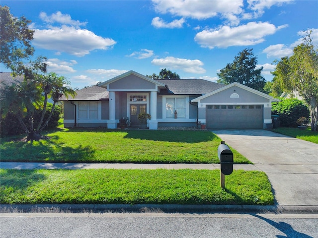 single story home with a front lawn and a garage