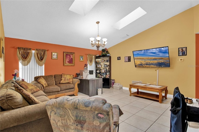 living room featuring a notable chandelier, vaulted ceiling with skylight, and light tile patterned floors