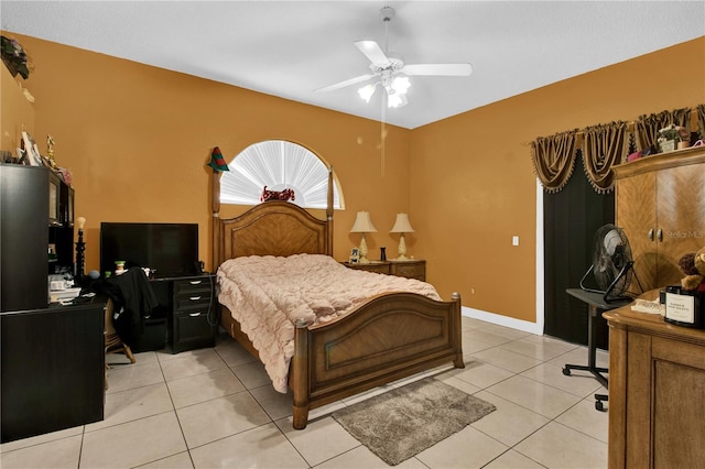 bedroom featuring ceiling fan and light tile patterned floors