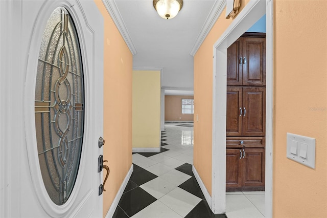 912 Ave T SE, Winter Haven, FL 33880 - entrance foyer with light tile patterned floors, baseboards, and crown molding