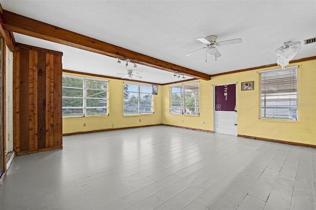 spare room with ceiling fan, beam ceiling, light hardwood / wood-style floors, and crown molding