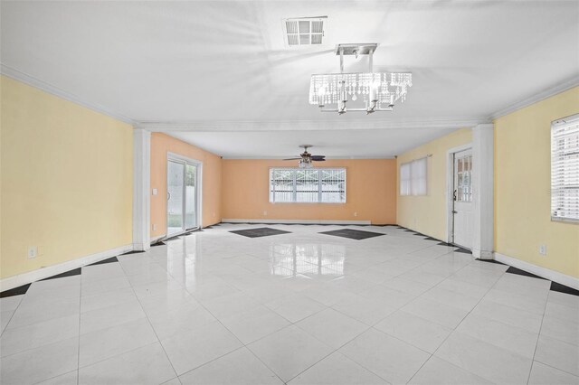 912 Ave T SE, Winter Haven, FL 33880 - empty room featuring light tile patterned floors, baseboards, visible vents, ornamental molding, and ceiling fan with notable chandelier
