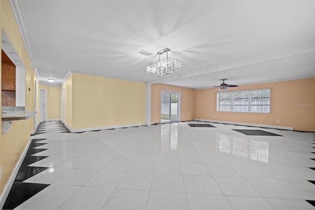 912 Ave T SE, Winter Haven, FL 33880 - spare room featuring visible vents, baseboards, light tile patterned flooring, and ceiling fan with notable chandelier