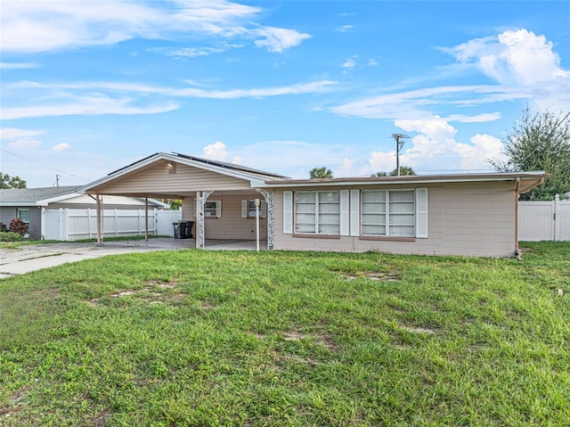 single story home featuring a front yard and a patio