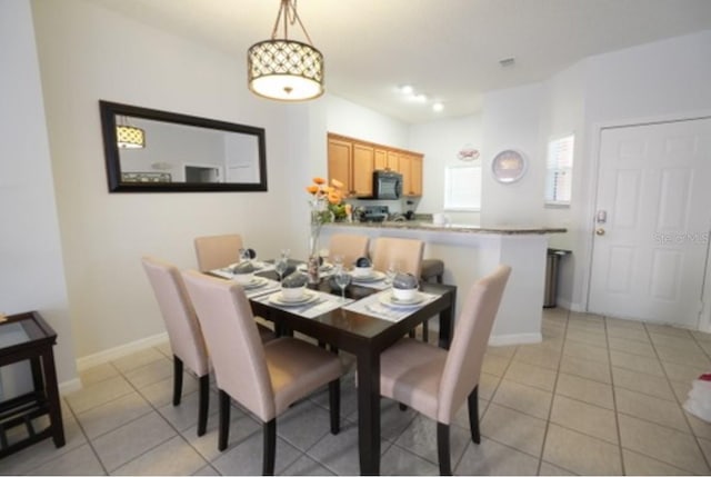 view of tiled dining space