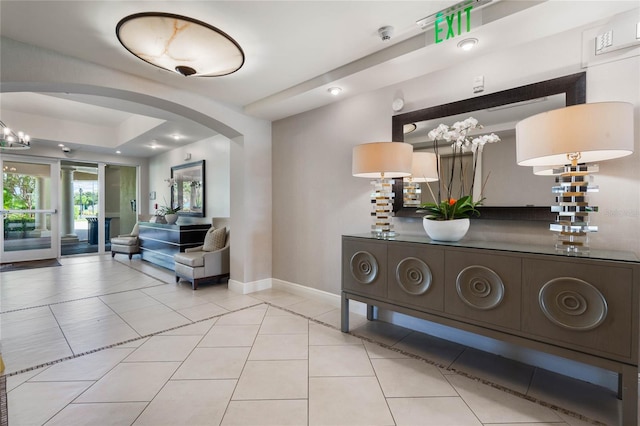 hallway featuring light tile patterned flooring