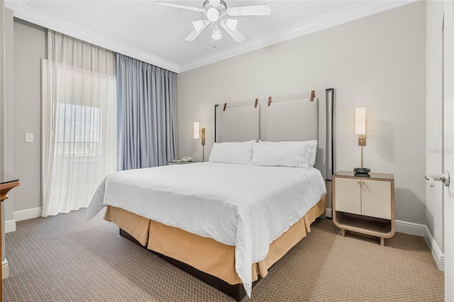 bedroom featuring crown molding, carpet flooring, and ceiling fan