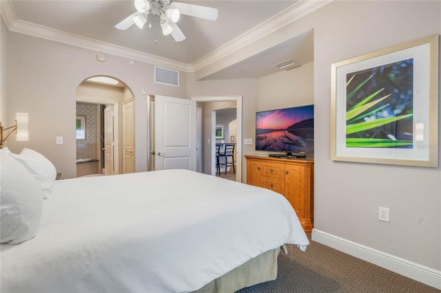 carpeted bedroom with ornamental molding and ceiling fan