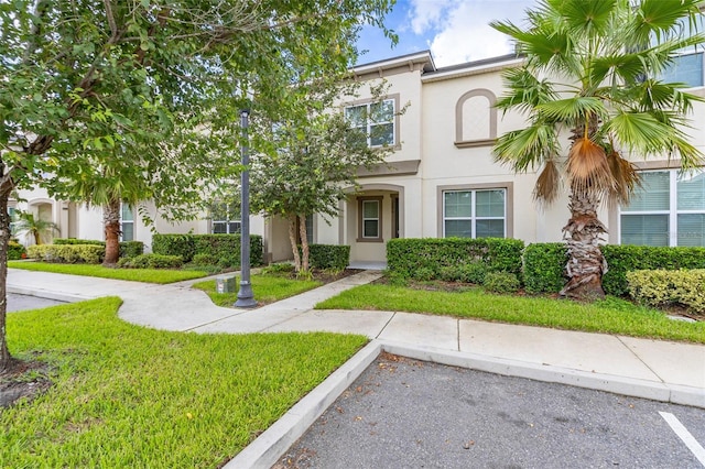 view of front of home with a front yard