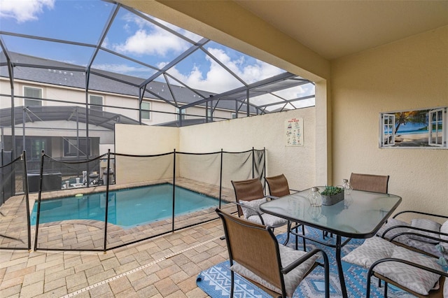 view of pool featuring a lanai and a patio