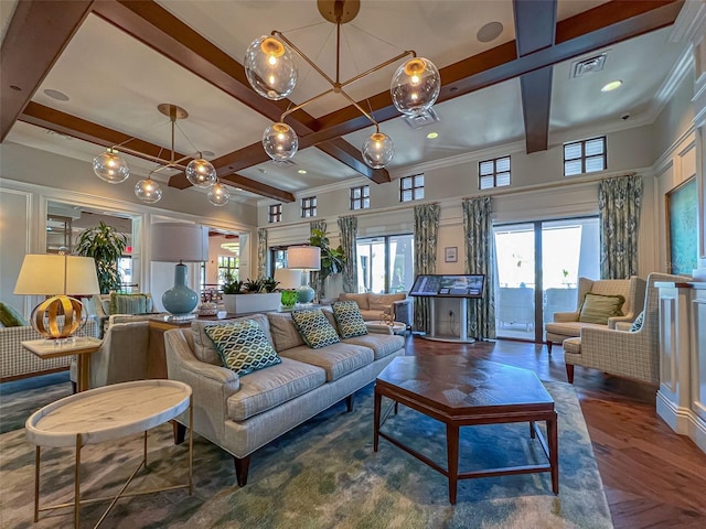 living room with coffered ceiling, beam ceiling, ornamental molding, dark hardwood / wood-style floors, and a chandelier