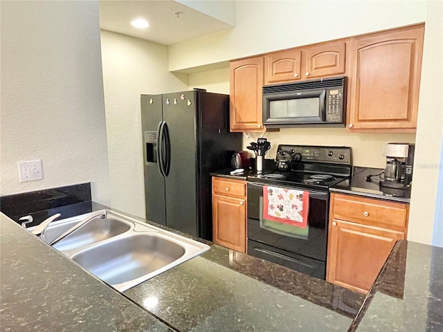 kitchen featuring black appliances and sink