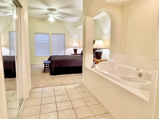 tiled bedroom with ceiling fan