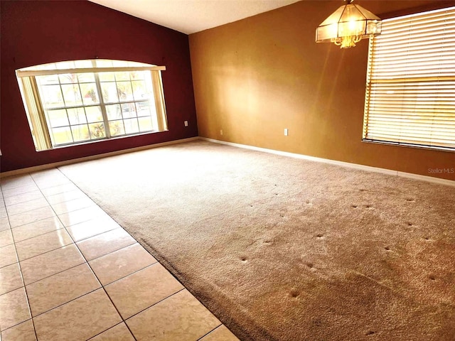 spare room with tile patterned floors