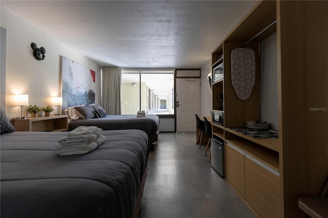 bedroom featuring a textured ceiling