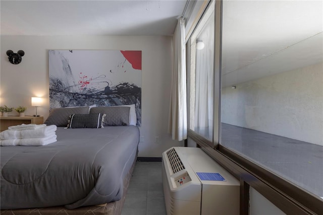 bedroom featuring tile patterned flooring