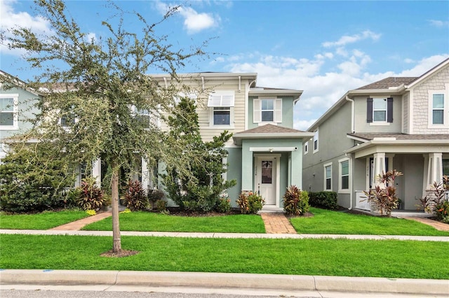 view of front of home with a front yard