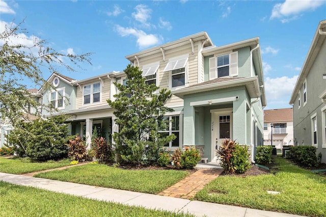 view of front of home with a front yard