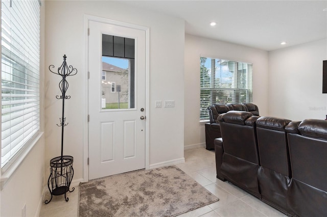 foyer entrance featuring light tile patterned floors