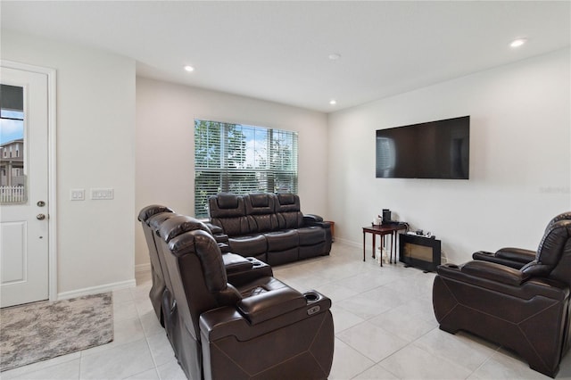 living room with light tile patterned floors