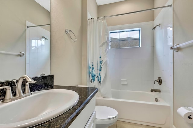 full bathroom with vanity, toilet, and shower / tub combo with curtain