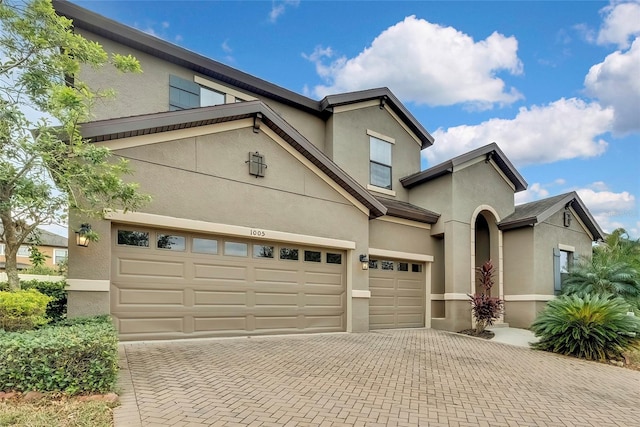 view of front of home with a garage