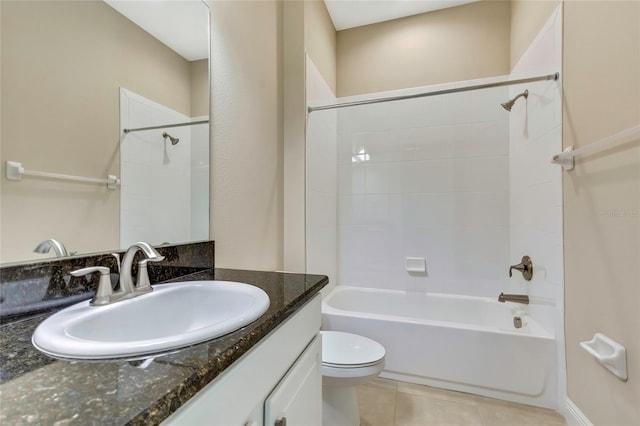 full bathroom featuring tile patterned floors, vanity, toilet, and bathtub / shower combination